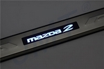 Накладки на пороги стальные с LED подсветкой JMT Mazda 2 II 2008-2014