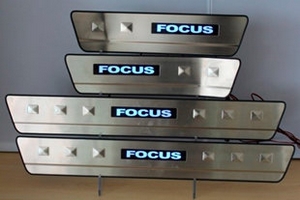 Накладки на пороги стальные с LED подсветкой JMT Ford Focus II 2005-2010 ― Auto-Clover