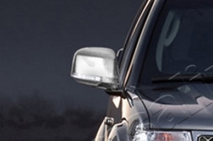 Хромированные накладки на зеркала с поворотником Omsa Line Nissan Navara 2004-2015 ― Auto-Clover