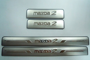 Накладки на пороги стальные JMT Mazda 2 II 2008-2014 ― Auto-Clover