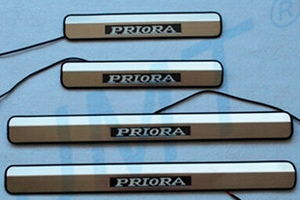 Накладки на пороги стальные с LED подсветкой JMT LADA Priora 2007-2015 ― Auto-Clover