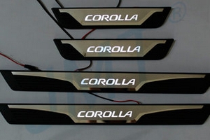 Накладки на пороги стальные с LED подсветкой OEM Style JMT Toyota Corolla 2013-2019 ― Auto-Clover